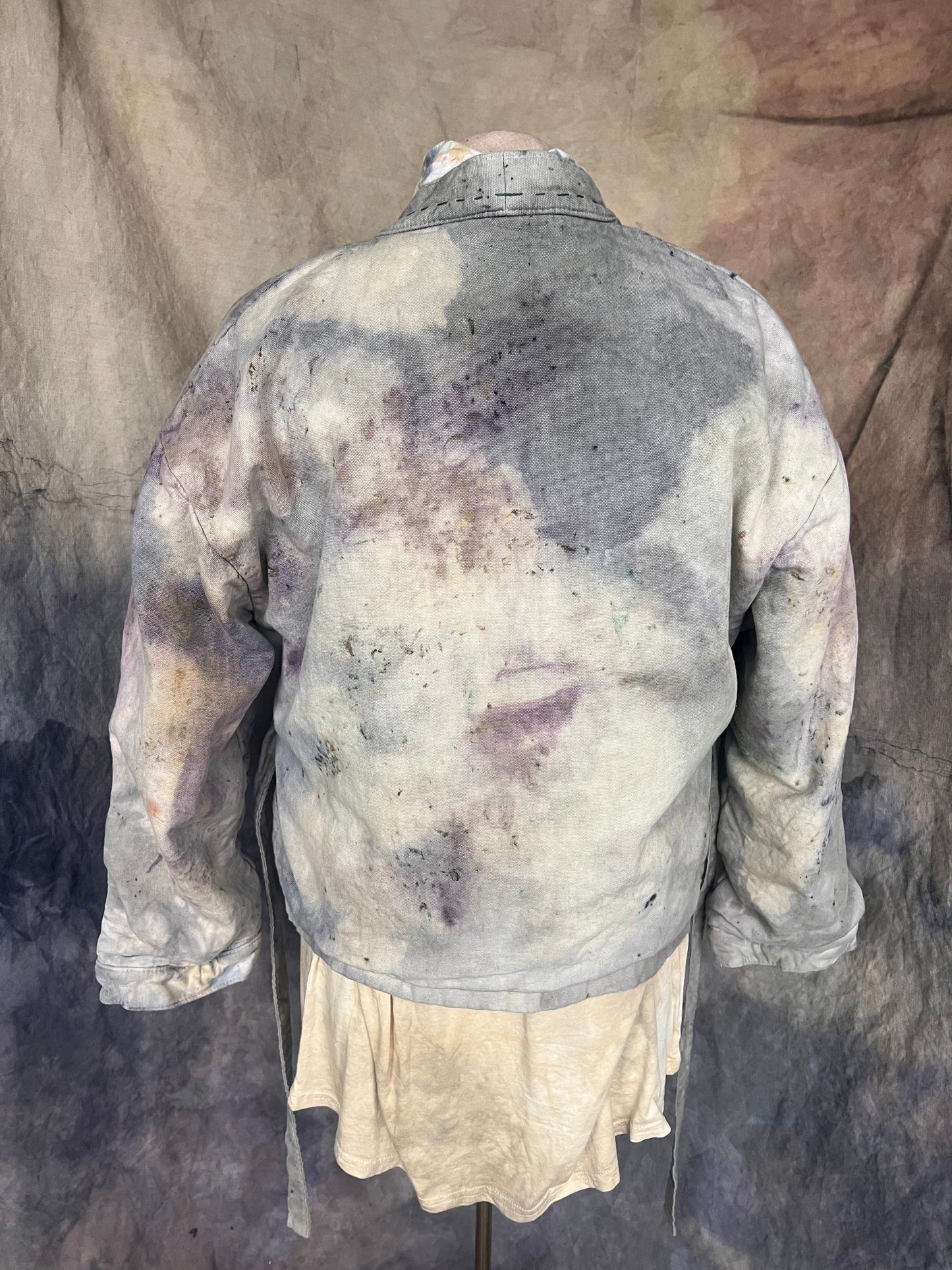 Back view of short kimono waist tie coat dyed with natural dyes with a grey and purple marble pattern