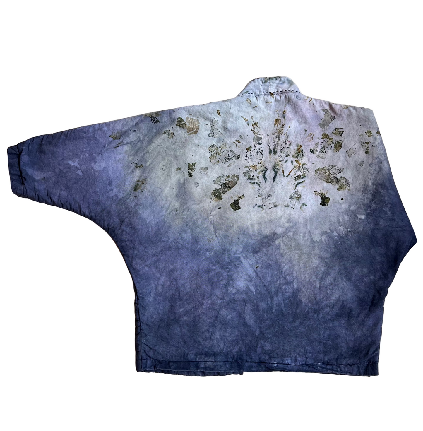 Back view of kimono jacket laid flat to show flower pattern.