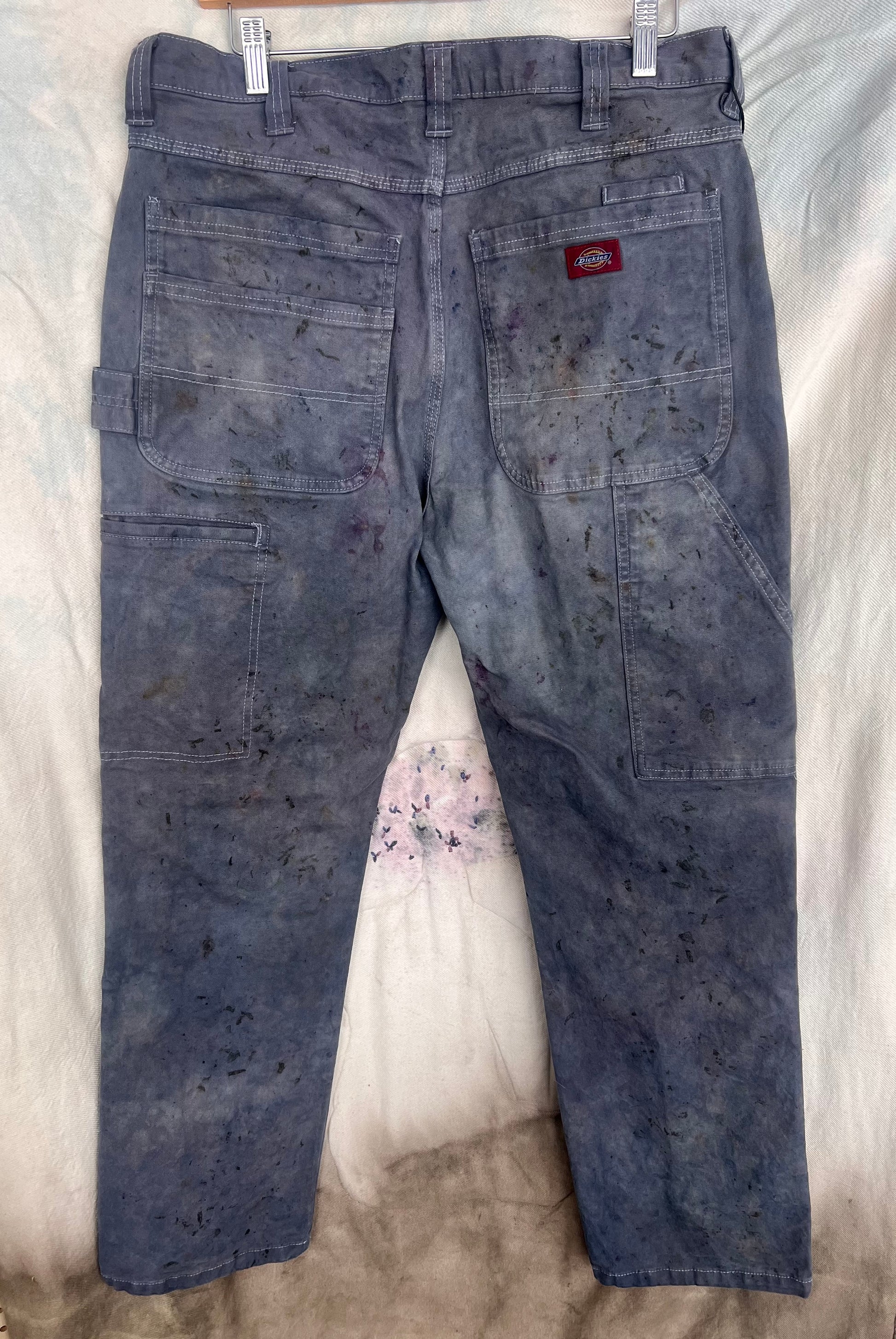 Back view of natural dyed Dickies painters pants