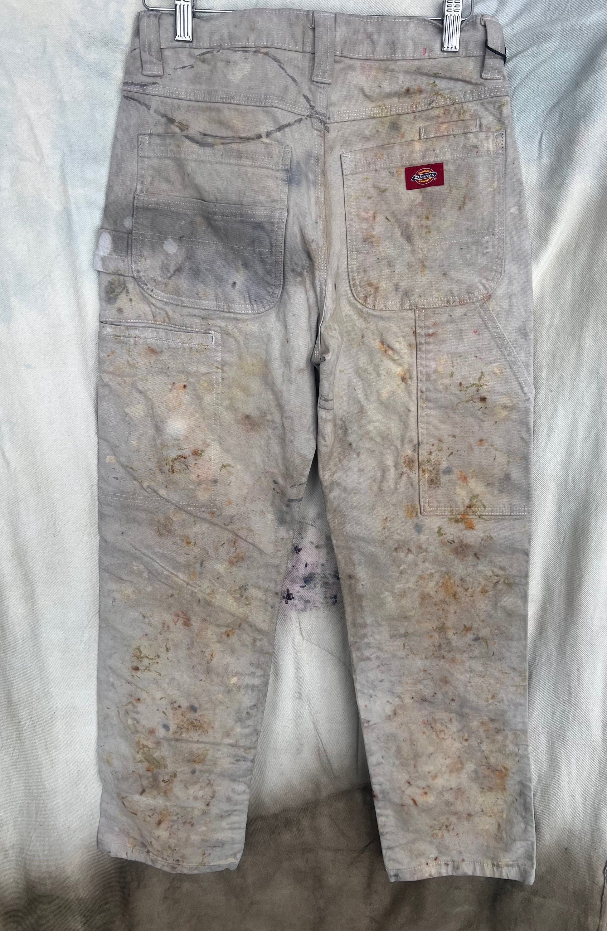 Back view of dickies painters pants dyed with flowers
