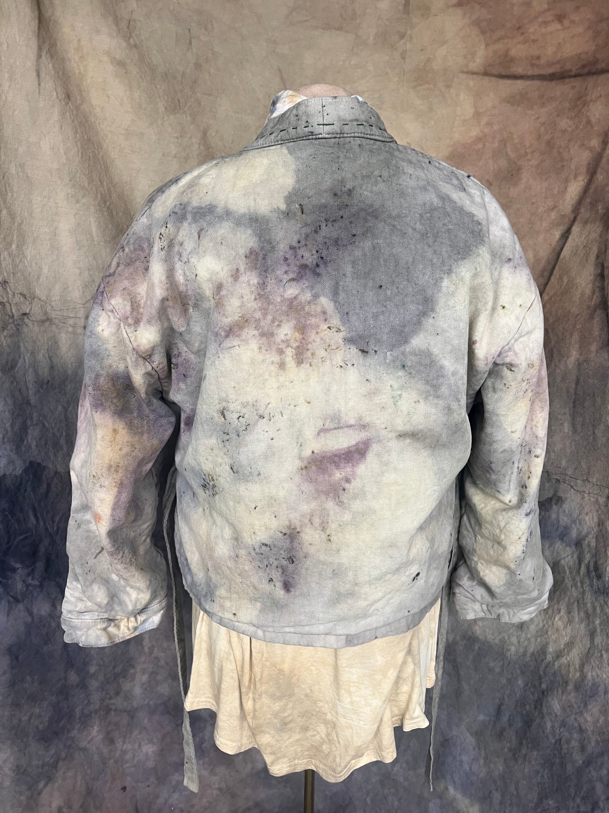 Back view of short kimono waist tie coat dyed with natural dyes with a  grey and purple marble pattern