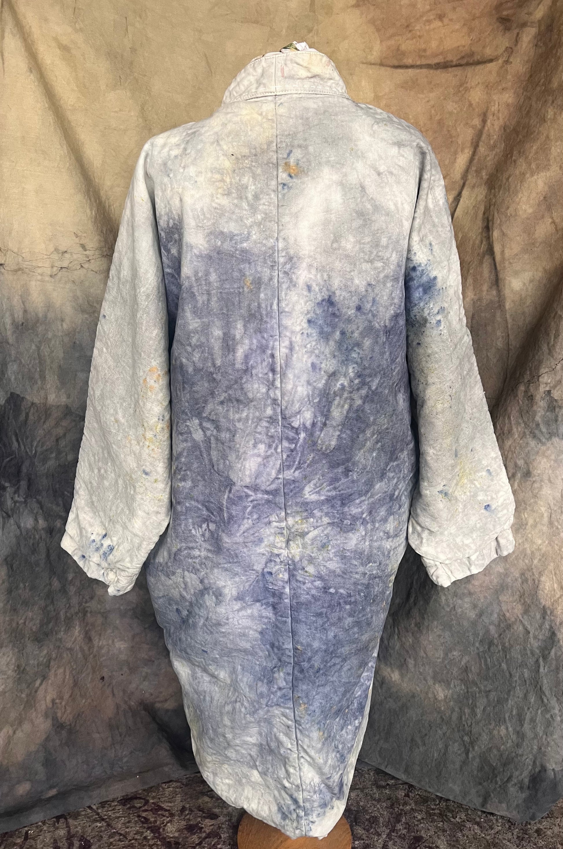 back view of kimono style blanket coat dyed with indigo and flowers.
